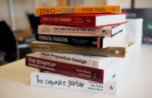 Open books and reading materials representing manuscript editing and proofreading